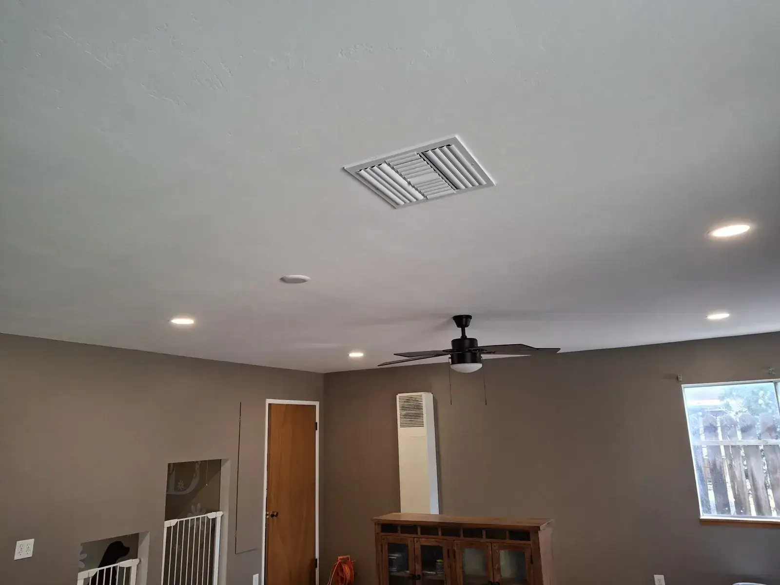 Finished living room after drywall repairs