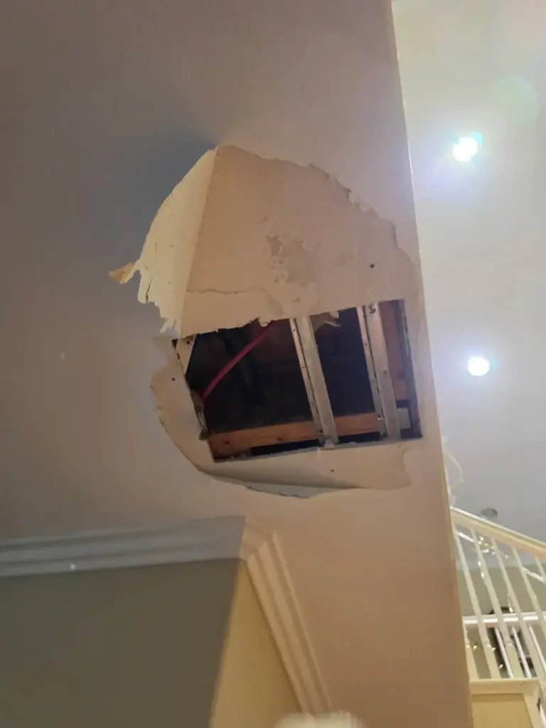 High access hole above staircase