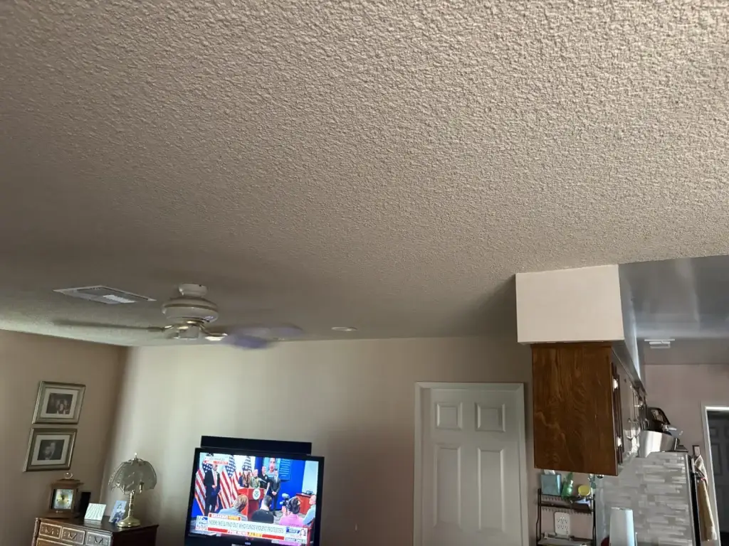 Popcorn ceiling in living room